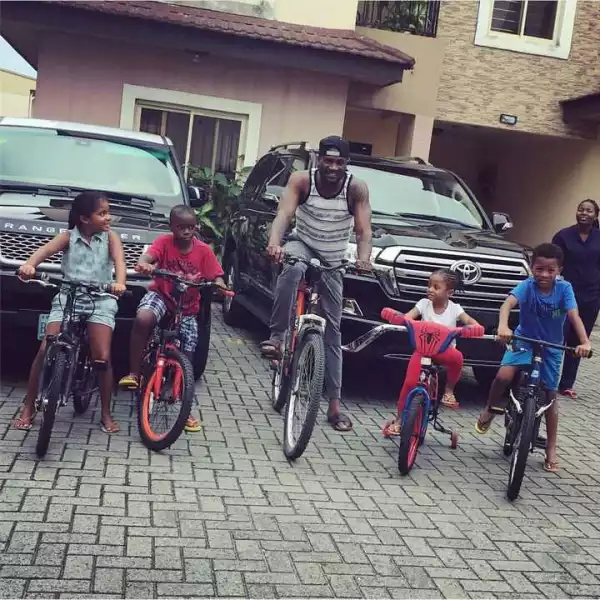 Photos: Peter Okoye Having Fun With His Son & Daughter In His House
